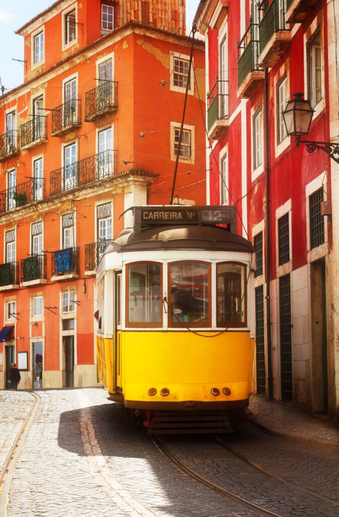tram on narrow street of Alfama, Lisbon
