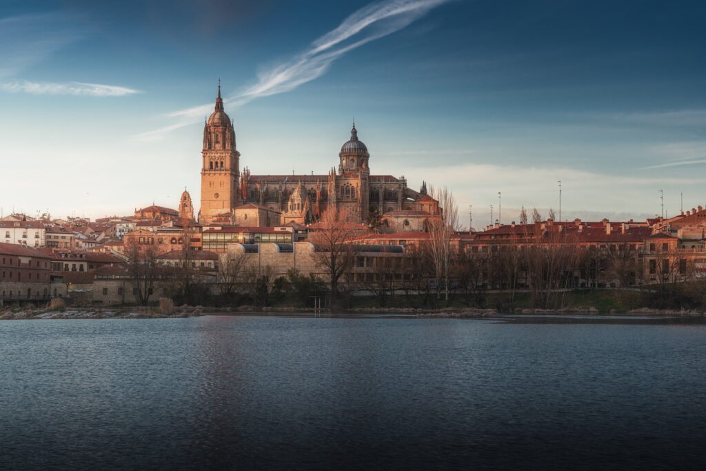 Salamanca Skyline at sunset with Cathedral and Tormes River - Salamanca, Spain